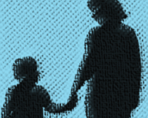 A child holding the hand of an adult.
